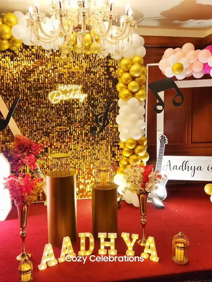 A music-themed 10th birthday with a large photo frame prop, perfect for guests to take fun pictures.