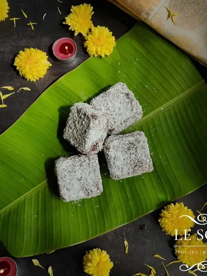 My popular Lamingtons made a return for the Onam menu. These are soft cake squares coated in chocolate and desiccated coconut, a favourite for any occasion.