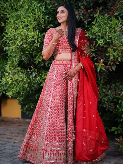 The complete reception look, showing how the hair, makeup, and lehenga come together for a show-stopping effect.