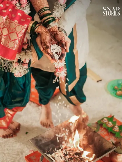 Capturing the sacred rituals is central to our wedding photography. This close-up of the Laja Homa ceremony highlights the intricate details and traditions that make your wedding unique.