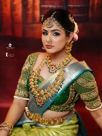 Notice the contouring and highlighting that gives dimension to the face, even with heavy traditional jewelry.