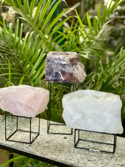My collection of crystal planters and holders, available in rose quartz, white quartz, and amethyst. These natural formations are believed to increase the flow of good energy and make a thoughtful gift.