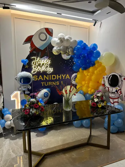 A full view of the space theme setup, demonstrating how we can transform a corner of a room into a festive photo zone.