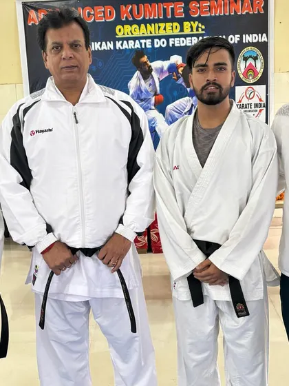 Posing with Hanshi Bharat Sharma after a productive seminar. These events provide invaluable insights and help us stay connected with the highest levels of the karate community.