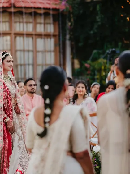 The bride's perspective as she walks towards the mandap, with all her loved ones watching. An emotional and powerful moment.