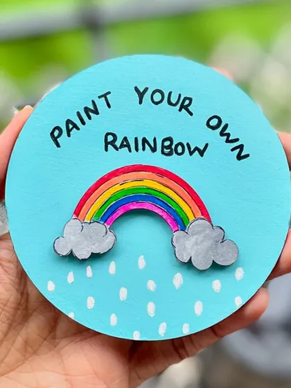 "Paint your own rainbow." I made this cheerful piece on a rainy day to uplift my own mood. It's a reminder to find color even on gloomy days.