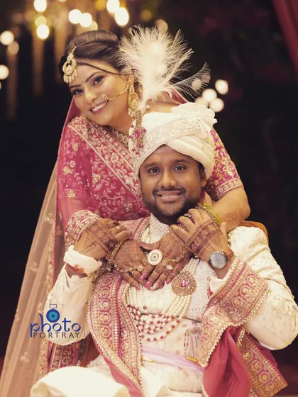 A playful and happy candid portrait of the bride and groom, capturing their joyful personalities.