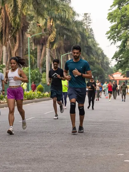 A coach and a member leading the pack during an outdoor run. We provide guidance and motivation to help you achieve your goals.