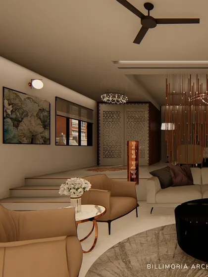 A multi-level living room design creates distinct zones for relaxation and conversation. A decorative screen adds a layer of privacy and texture, while the neutral tones create a cohesive, calming environment.