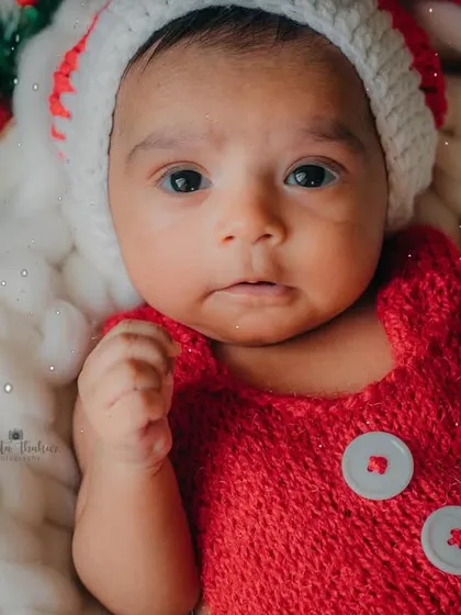 A close-up of this little Christmas miracle. Those big, beautiful eyes are full of holiday wonder.