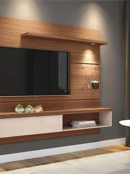 A classic and popular design, this floating TV unit combines a wood-paneled back with a clean white drawer. It's a simple, affordable, and stylish solution for any modern living room.