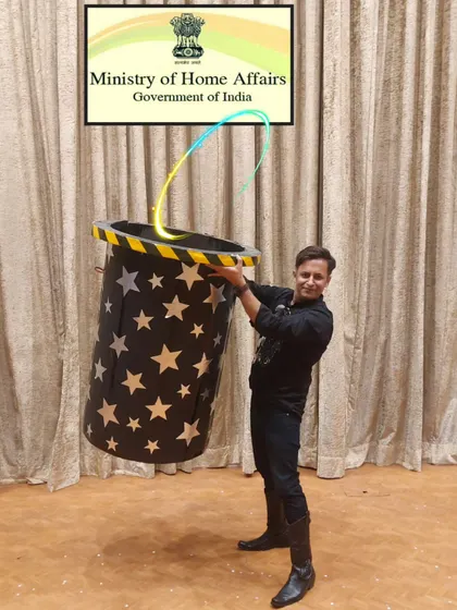 A fun shot with my production prop at the Ministry of Home Affairs family day. This classic prop allows me to produce a surprising number of items, delighting both children and adults.