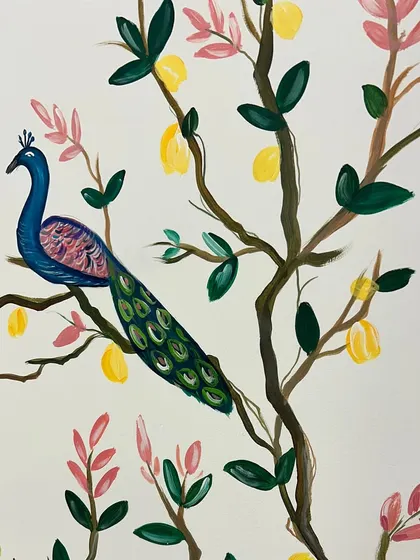 Another close-up of a peacock in the mural. The pink and green foliage complements the rich blues and greens of the bird.