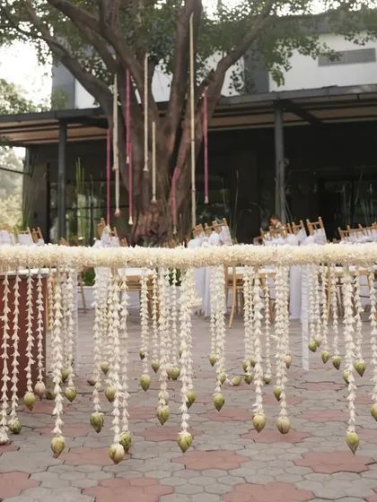 A beautiful floral "chadar" made of hanging jasmine and lotus buds, used for the bride's entrance.