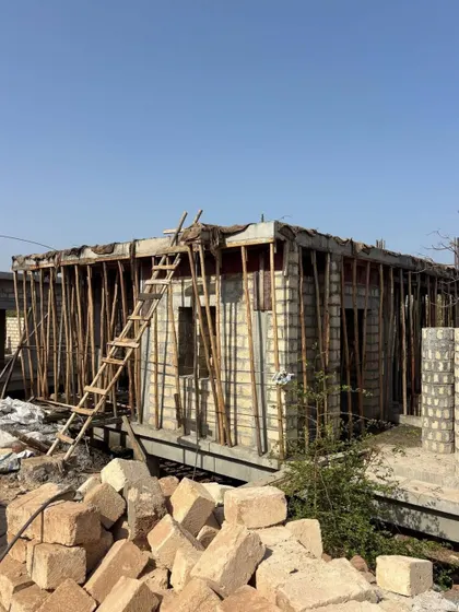 A snapshot from a work-in-progress site, where raw materials are being sculpted into purposeful spaces. This image captures architecture in its dynamic state of emergence, before the finishing touches are applied.