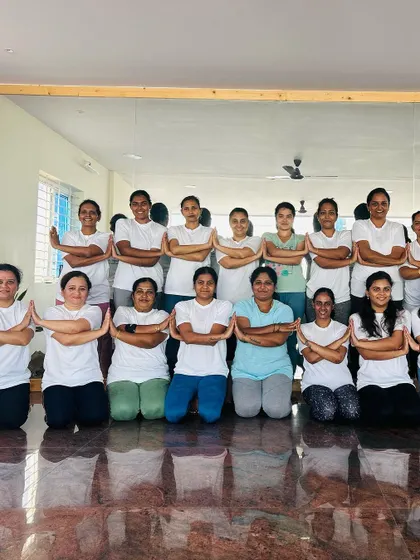 A wider view of our amazing students. Completing 108 Sun Salutations is a test of endurance and spirit, and they all passed with flying colors.