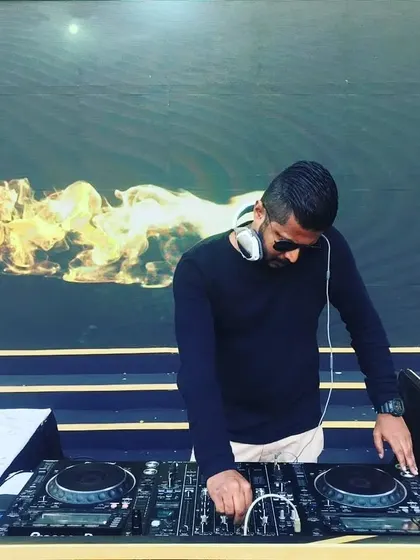 The music makes me happy. This photo captures the feeling I get when I'm playing a track that truly resonates with me and the crowd.