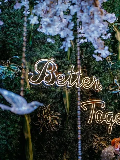 A beautifully blurred shot of our "Better Together" neon sign, creating a romantic and dreamy atmosphere.