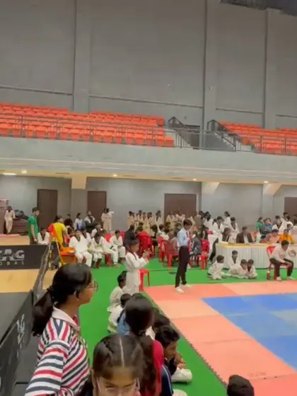The bustling atmosphere at the Taekwondo Games & Sports Festival. Events like these are vital for giving young athletes exposure to competitive environments and fostering a sense of community.