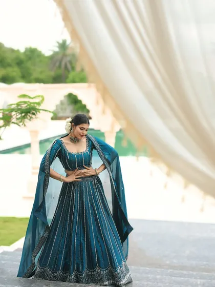 A powerful and elegant pose. The makeup is kept sophisticated to match the modern, chic vibe of the lehenga.
