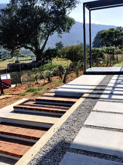 A detail of the hardscaping at the Nandi Hills project, showing brick steps and a gravel path with stone pavers. All materials were kept local and simple to blend in with the natural surroundings.