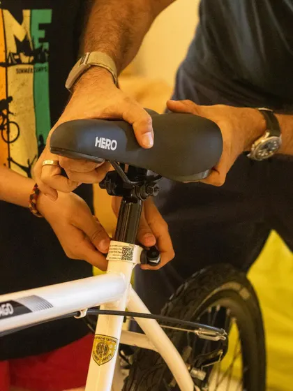 Adjusting the bicycle seat is a simple but important skill. We guide students through each step of the process, ensuring they learn by doing.