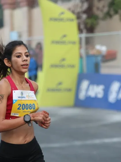 The intensity of racing. This photo captures the moment of pushing through the pain barrier, a skill we develop through consistent and challenging training.