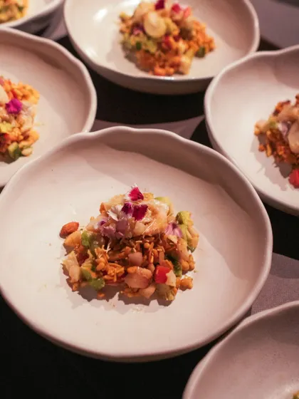My take on the classic street food, jhalmuri. I elevate it with poached lobsters and a special mix of masalas, creating a symphony of flavors and textures.
