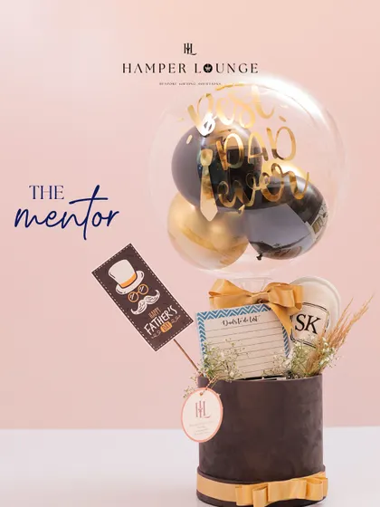 For the dad who is a mentor, this sophisticated Father's Day hamper includes a personalized journal and other thoughtful items, topped with a stylish balloon.