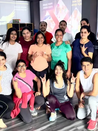 The heart and soul of my classes. Each photo captures a unique moment with my incredible community after a sweaty, joyful session. This is our shared victory lap.