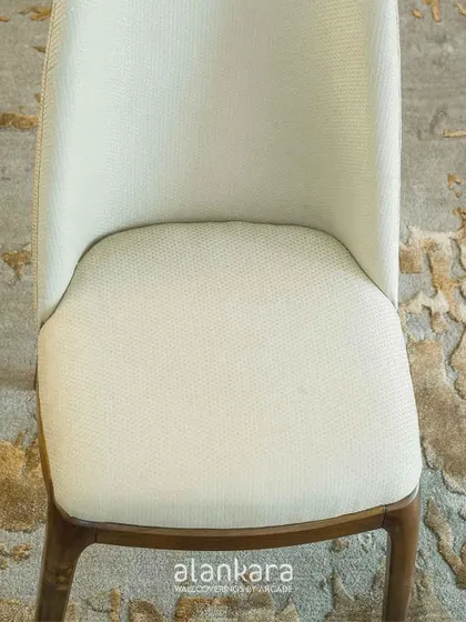 Another close-up of the Arber chair's seat, emphasizing its comfortable and stylish design.