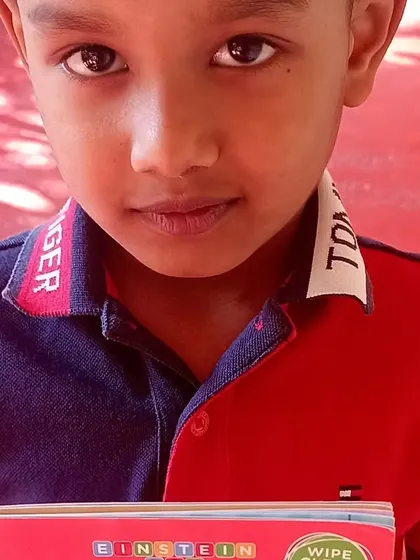 Another view of a student with his book.