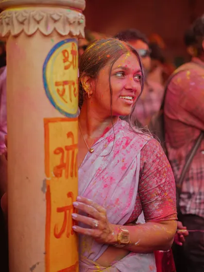 A vibrant collection of images from the Holi celebrations in Braj, specifically Nandgaon. This series captures the pure ecstasy of the festival, with portraits of devotees, men dressed as gopis, and crowds dancing in a cloud of colors.