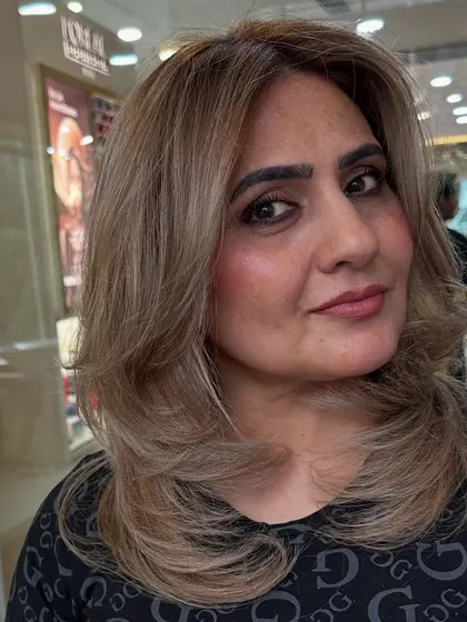 A close-up of this client's fresh blonde look. You can see the seamless blend of tones that make the color look both vibrant and natural.