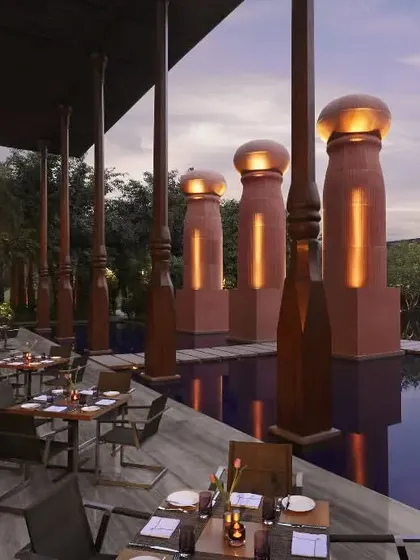 We celebrate global cuisines at our restaurants. Kiyan, pictured here, offers a beautiful alfresco dining experience by the water, perfect for any meal of the day.