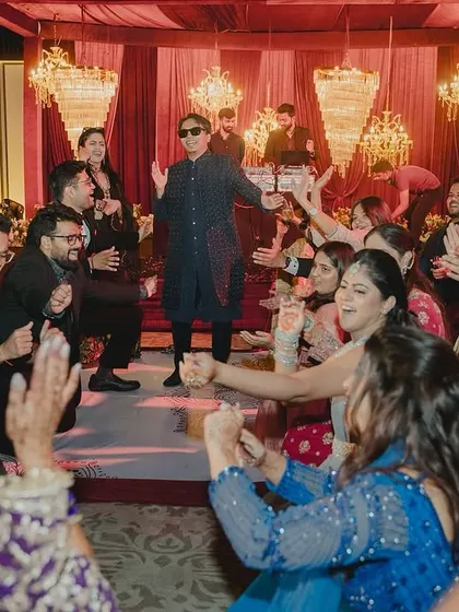 A snapshot of the "roller-coaster ride of Emotions & Laughter" from a Sangeet night I hosted. As an emcee, my job is to make sure everyone is engaged and having a blast.