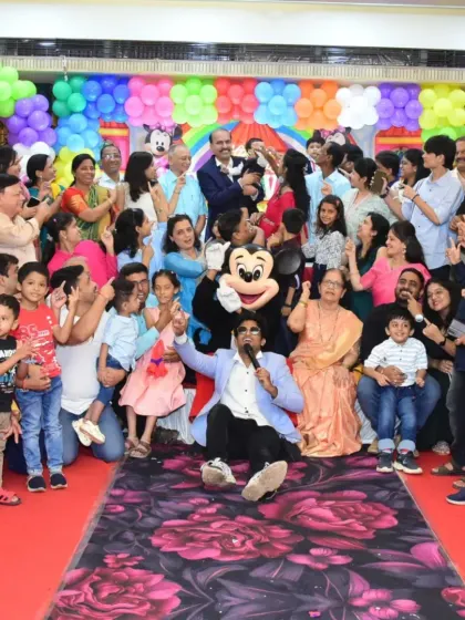 This is what a successful event looks like to me: a room full of happy faces. As a host, my main job is to bring everyone together for a memorable group experience, and this photo from a birthday party captures that energy perfectly.