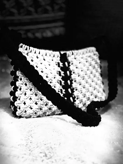 A dramatic black and white shot of my baguette bag. It really highlights the texture and contrast of the design.