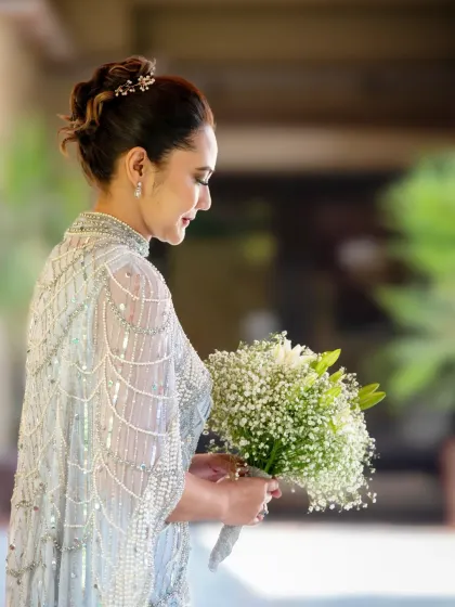 A beautiful solo portrait of the bride celebrating her silver wedding anniversary. She looks absolutely radiant and timeless.