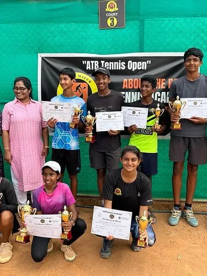 A duplicate group photo of the tournament winners.