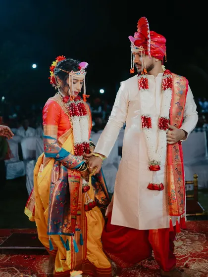 A sacred moment from Rohit and Gayatri's wedding in Raigad, as they take their first steps together as a married couple.