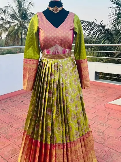 This gown is a perfect fusion of traditional fabric and modern silhouette.