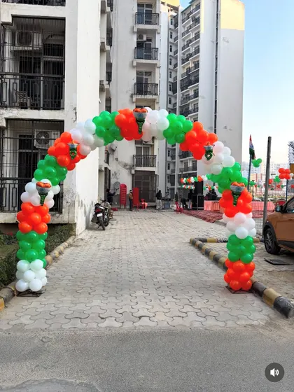 An Independence Day (15th August) decoration for a residential society. The entrance features a balloon arch in the Indian tricolor.