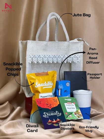 An eco-friendly gifting option. This jute bag contains an eco-friendly mug, a passport holder, various snacks, and a Diwali card for a complete and thoughtful gift.