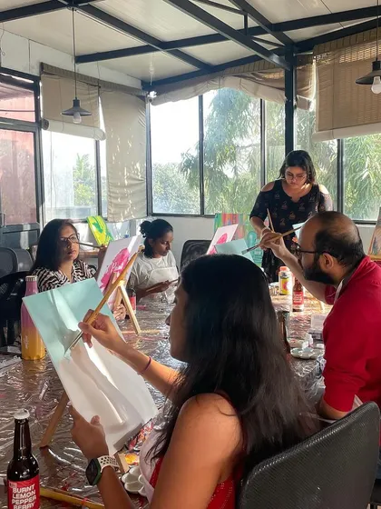 A group of artists in our studio during a gold leaf open house. The atmosphere is always fun and supportive.