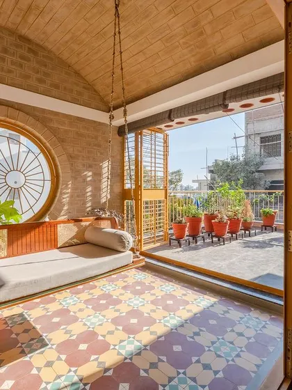 Another perspective of the sun-drenched swing room.