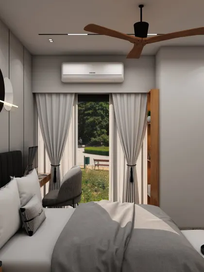 A view from the bed towards the window, showing how we design spaces to maximize natural light and create a connection with the outdoors.