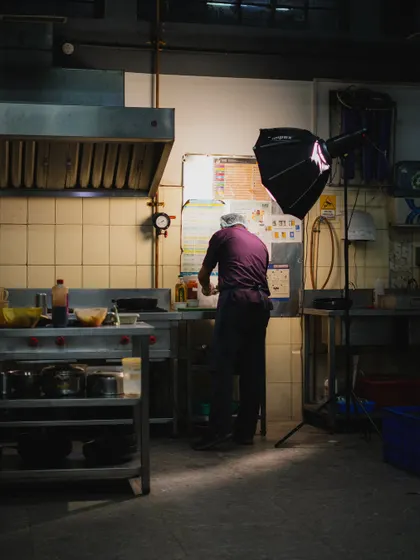 Every dish has a story, and it starts right here in our kitchen. This shot captures the dedication of our chefs as they pour their hearts into every meal they create.