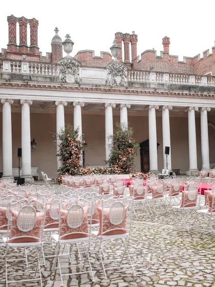 Different angles of the stunning floral mandap and ceremony setup at Hampton Court Palace, showing the scale and detail of the design.