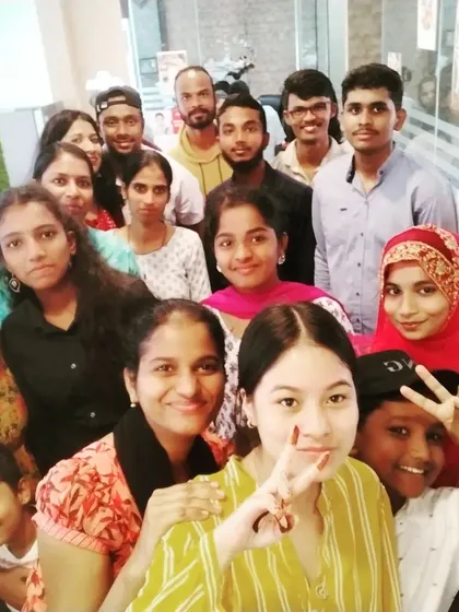 A cheerful group selfie with our students, including some of our youngest members from the kids program. These moments of connection are what make our academy special.